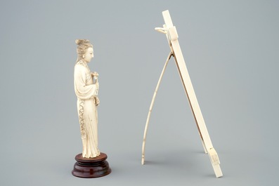 A Chinese Canton ivory frame and a carved figure of Guanyin, 19th C.