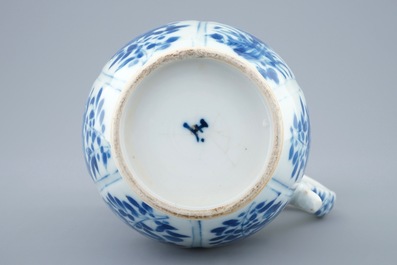A Chinese blue and white jug and cover, Kangxi