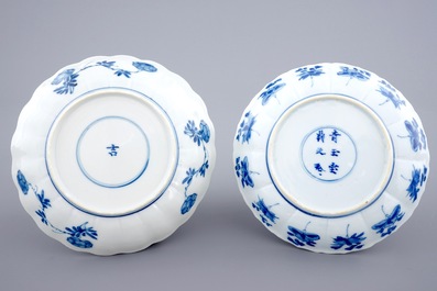 Three Chinese blue and white plates and a lotus shaped cup and saucer, Kangxi