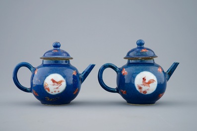 A pair of small Chinese powder blue teapots with roosters, Kangxi