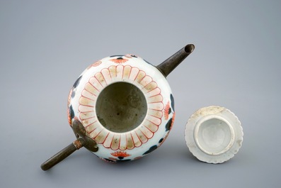 A Japanese Imari teapot and cover with replaced spout and handle, 18th C.