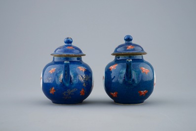 A pair of small Chinese powder blue teapots with roosters, Kangxi
