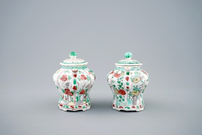 A pair of Chinese famille verte teapots and covers, Kangxi