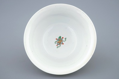 A Chinese famille verte caf&eacute; au lait ground bowl with precious objects, Kangxi