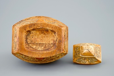 A Chinese parcel-gilt ivory vase and cover on wooden stand, 19th C.