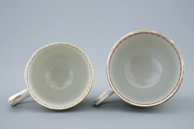 Two Chinese armorial cups and saucers, Qianlong, 18th C.
