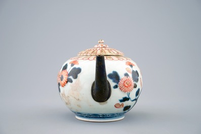 A Japanese Imari teapot and cover with replaced spout and handle, 18th C.