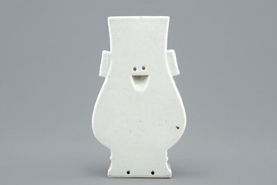A Chinese blue and underglaze red fanghu shape wall vase, 19th C.
