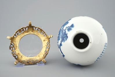 A Chinese blue and white meiping vase on gilt bronze stand, 19th C.