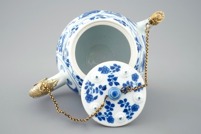 A fine blue and white Chinese teapot and cover with gilt silver mount, Kangxi
