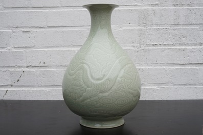 A Chinese celadon underglaze decorated yuhuchunping dragon vase, 19/20th C.