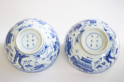 A pair of Chinese blue and white "Boys" bowls, Kangxi