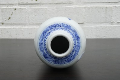 A blue and white Chinese vase with a mountainous landscape, Kangxi