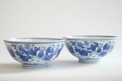A pair of Chinese blue and white "Boys" bowls, Kangxi