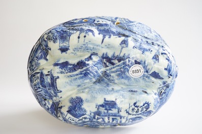 An unusual blue and white Chinese porcelain walnut-shaped hanging ornament or lid, 18th C.