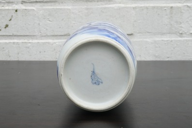 A blue and white Chinese vase with a mountainous landscape, Kangxi