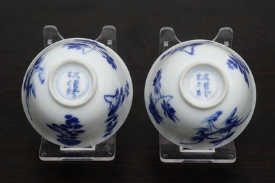 A pair of Chinese blue and white wine cups with 4 floral patterns, six-character mark, Kangxi