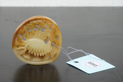 A Chinese jade carving with a phoenix, 19th C.