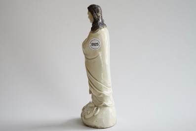 An unusual Chinese Dehua blanc de Chine figure of a black-scarved Luohan, 19th C.