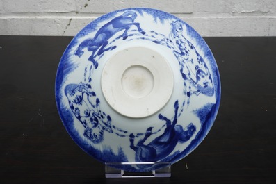 A Chinese blue and white conical bowl: "Horses of Mu Wang", Kangxi