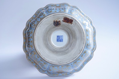 A Chinese lavender blue and gilt octafoil lobed bowl in box, Qianlong mark, 20th C.
