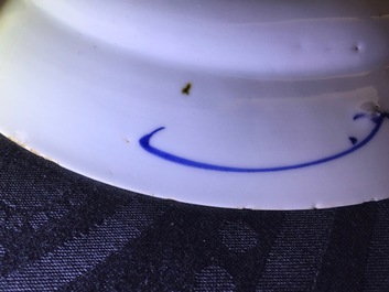 A Chinese blue and white plate after a Dutch Delft example, Qianlong, 18th C.