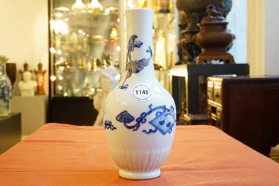 A Chinese blue and white and underglaze red vase with a dragon, Kangxi