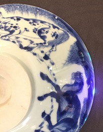 A Chinese blue and white conical bowl: "Horses of Mu Wang", Kangxi