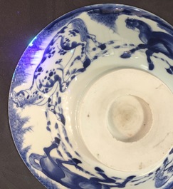 A Chinese blue and white conical bowl: "Horses of Mu Wang", Kangxi