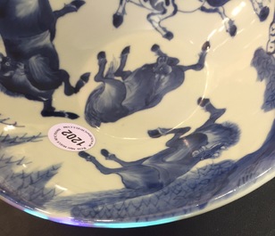 A Chinese blue and white conical bowl: "Horses of Mu Wang", Kangxi