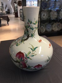A fine Chinese famille rose tianqiuping "Nine peaches" vase, Guangxu mark, 19/20th C.