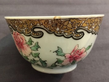 A Chinese famille rose eggshell cup and saucer with butterflies among flowers, Yongzheng, 1723-1735