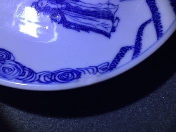 A blue and white Chinese cup and saucer with "The crucifixion", Kangxi
