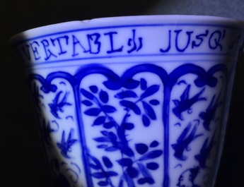 A rare Chinese blue and white Kangxi cup and saucer with French text, Kangxi