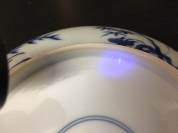 A Chinese blue and white plate with figures in a garden, Xuande mark, Yongzheng, 1723-1735