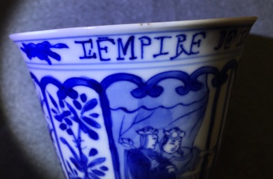A rare Chinese blue and white Kangxi cup and saucer with French text, Kangxi