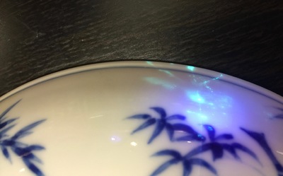 A Chinese blue and white plate with figures in a garden, Xuande mark, Yongzheng, 1723-1735
