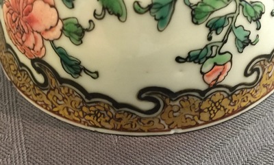 A Chinese famille rose eggshell cup and saucer with butterflies among flowers, Yongzheng, 1723-1735