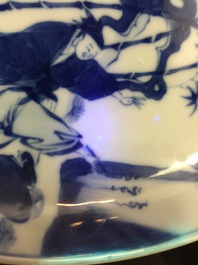 A Chinese blue and white plate with figures in a garden, Xuande mark, Yongzheng, 1723-1735
