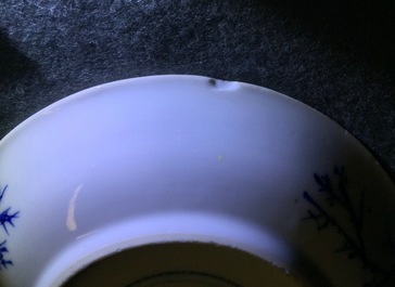 A blue and white Chinese cup and saucer with "The crucifixion", Kangxi