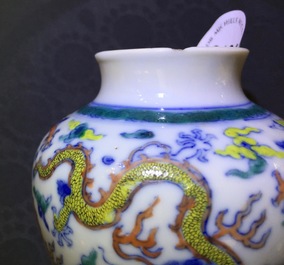 A small Chinese doucai jar vase with dragons among clouds, Qianlong mark, 19th C.