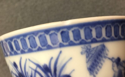 A Chinese blue and white cup and saucer with "La Dame au Parasol" after Pronk, ca. 1740