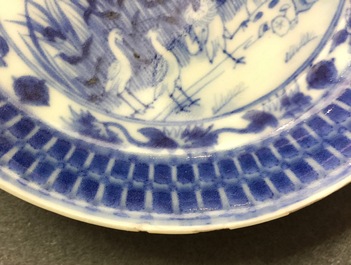 A Chinese blue and white cup and saucer with "La Dame au Parasol" after Pronk, ca. 1740