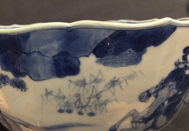 Un bol en porcelaine de Chine bleu et blanc &agrave; d&eacute;cor de cavaliers, Kangxi