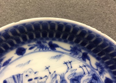 A Chinese blue and white cup and saucer with "La Dame au Parasol" after Pronk, ca. 1740
