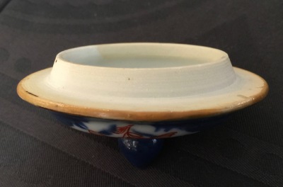 A Chinese powder blue and iron red decorated teapot and cover, Kangxi