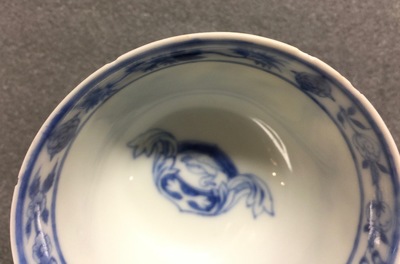 A Chinese blue and white cup and saucer with "La Dame au Parasol" after Pronk, ca. 1740