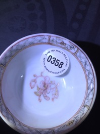 A Chinese eggshell ruby ground cup and saucer, Yongzheng, 1723-1735