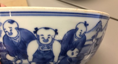 A pair of Chinese blue and white "Boys" bowls, Kangxi