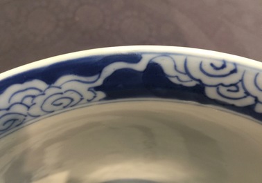 A Chinese blue and white bowl with a river scene, Kangxi